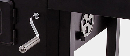 Регулируемая при помощи ручки решетка для угля